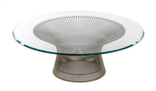 A Warren Platner Glass and Chromed Low Table, Height 14 3/4 x diameter 42 inches.