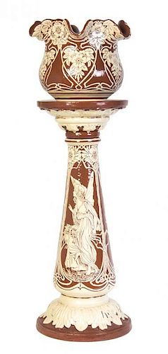 An Art Nouveau Pottery Jardiniere and Pedestal, Watcombe, Height overall 38 3/4 inches.