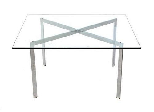 A Ludwig Mies Van Der Rohe Chromed and Glass Low Table, Height 18 x width 35 1/2 x depth 35 1/2 inches.