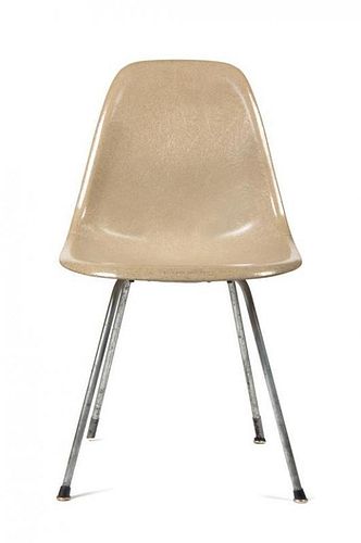* Six Charles and Ray Eames Fiberglass Shell Chairs, Height 32 inches.