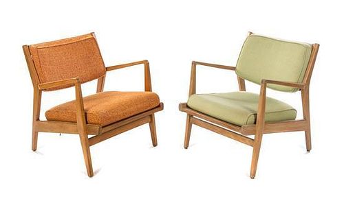* A Pair of American Walnut Lounge Chairs, Height 29 1/2 inches.