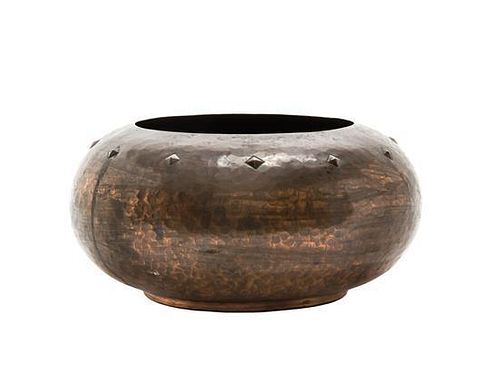 A WMF Hammered Copper Bowl, Diameter 9 1/2 inches.