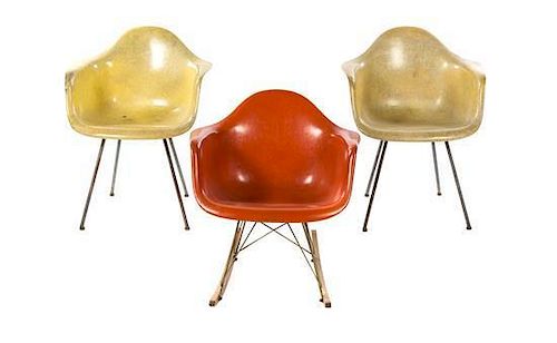 * Three Charles and Ray Eames Fiberglass Chairs, Height of first pair 31 1/2 inches.
