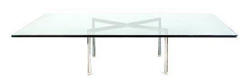 * A Ludwig Mies Van Der Rohe Chromed and Glass Low Table, Height 15 1/2 x width 70 x depth 50 inches.