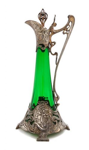 * An Art Nouveau Glass and Silvered Metal Mounted Ewer, Height 16 1/8 inches.