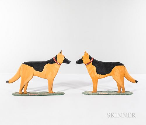 Pair of "BOSS" Dog Sculptures