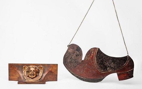 Renaissance Style Carved Walnut and Parcel-Gilt Cherub Head Wall Shelf and a French Cut and Painted Tin Shoemaker Sign