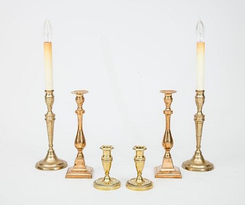 Pair of Flemish Brass Candlestick Lamps, a Pair of Flemish Bell-Metal Candlesticks, and a Pair of Small French Brass Candlesticks