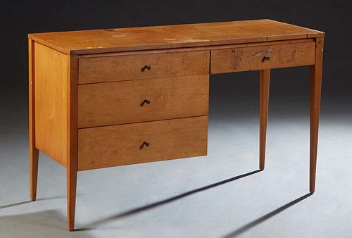 Paul McCobb Planner Group Mid-Century Modern Maple Desk, mid 20th c., with two frieze drawers over two drawers on one side, labeled in the upper left 