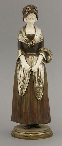Dominique Alonzo (French, fl.1910-1930),<BR>'Off to Market', a bronze and ivory figure of a young la