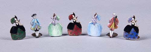 SEVEN ENAMELED PLACE CARD HOLDERS, 1920s