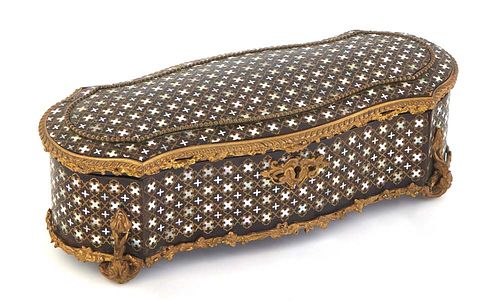 French Tahan Bronze Mounted Mother-of-Pearl Inlaid Jewelry Box, 19th c., of shaped oval form with a relief arched lid, on bronze feet, signed on the l