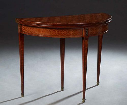 English Ormolu Mounted Parquetry Inlaid Demilune Games Table, late 19th c., the top opening to a green baize lined gaming surface, over a floral inlai