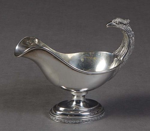 German .800 Silver Figural Gravy Boat, 19th c., with an eagle head handle, the foot with a relief shell banding, H.- 6 3/8 in., W.- 3 1/2 in., D.- 7 3