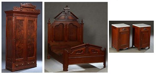 American Eastlake Assembled Three Piece Carved Walnut Bedroom Suite, c. 1880, consisting of a highback double bed with an incised peaked headboard to 