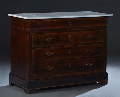 French Provincial Louis Philippe Carved Walnut Marble Top Commode, 19th c., the white figured rounded corner marble over a compartmented frieze drawer