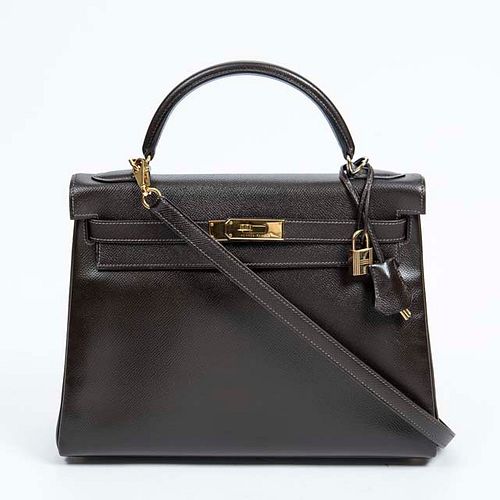 Hermes Kelly Retourne Shoulder Bag, c. 2000, in havane brown courchevel calf leather with golden hardware, opening to a matching brown leather interio