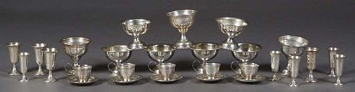 Group of Sterling, consisting of five demitasse cup holders and matching saucers, five Gorham liqueur cups, a weighted liqueur cup, and nine weighted 