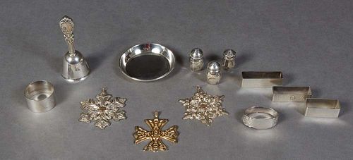 Group of Thirteen Sterling Pieces, 20th c., consisting of 5 napkin Rings, 3 Reed and Barton Christmas ornaments; 3 individual salt and pepper shakers;