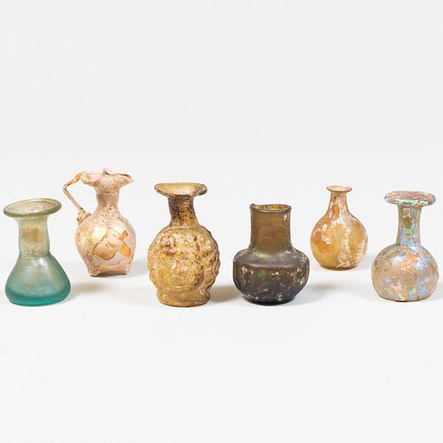 Group of Five Small Roman Glass Vessels together with a Double-Sided Janus Jar