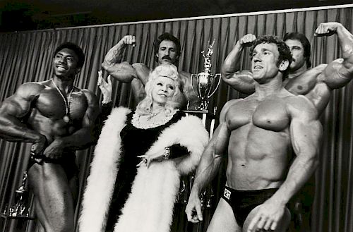 Gary Leonard (b.1951)<BR>'MAE WEST WITH MR. AMERICA CONTESTANTS';<BR>'PRINCE'<BR>Two photographs<BR>