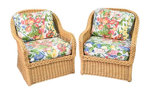 Bielecky Brothers Two Piece Wicker Set, to include two armchairs, along with custom cushions, height 32 inches, width 29 inches.
