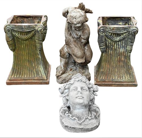 Four Piece Outdoor Lot, to include stone putti with koi fish, along with a pair of iron bases, figure height 27 inches, base height 20 1/2 inches; alo