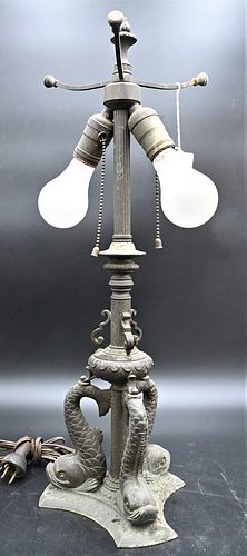 Triple Dolphin Base Lamp, for glass shade, height 22 inches. Provenance: Estate of Florence Yannios, Cheshire, CT.