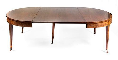 A Mahogany Extension Dining Table, Height 29 1/2 x width 104 x depth 60 inches.
