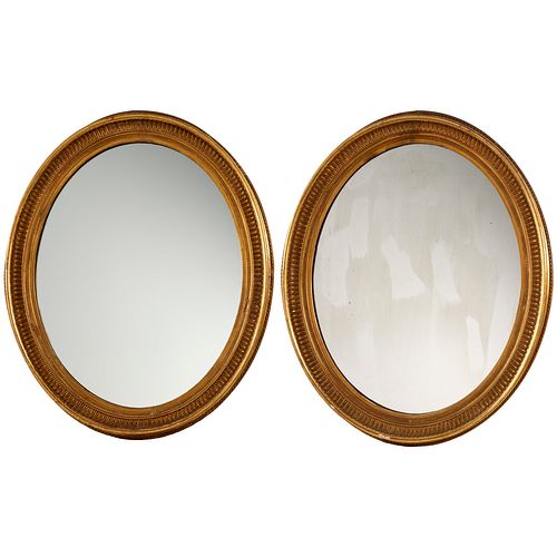 Pair George III giltwood oval mirrors
