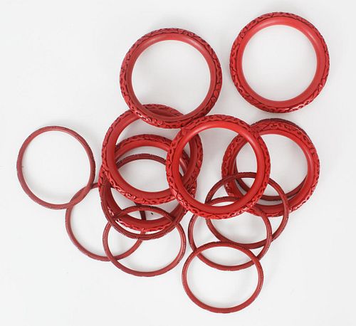 Set of (14) Chinese Red Cinnabar Carved Bangles