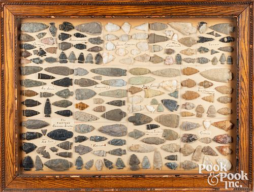 Framed collection of arrowheads, etc.