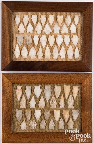 Two wood frames, containing prehistoric points