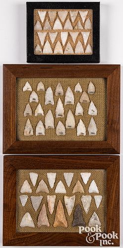 Collection of sixty-three triangular arrowheads