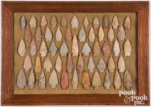 Wood frame containing colorful quartzite points