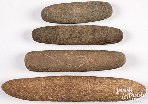 Four ancient stone pestles