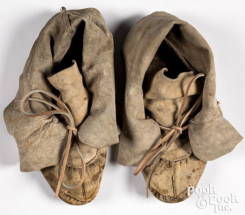 Two pairs of Native American hide moccasins