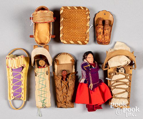 Group of Native American dolls and cradleboards