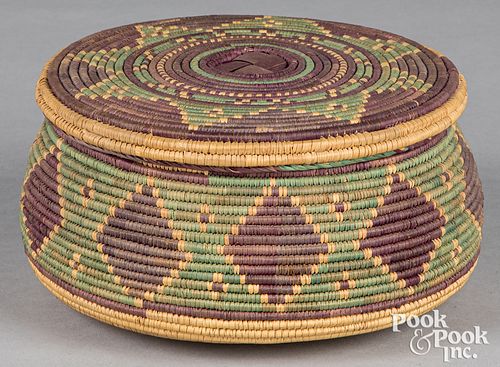 Polychrome coiled tribal basket with lid