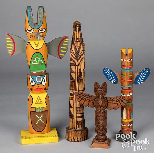 Three Pacific Northwest Coast totem poles, etc.
