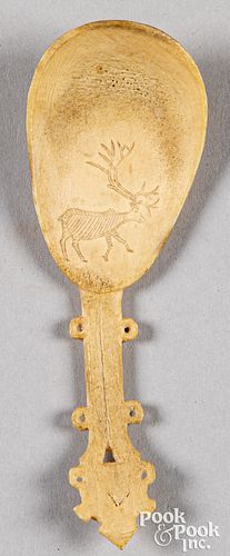 Sami scrimshaw spoon with image of reindeer