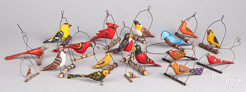 Eighteen Jonathan Bastion carved hanging birds