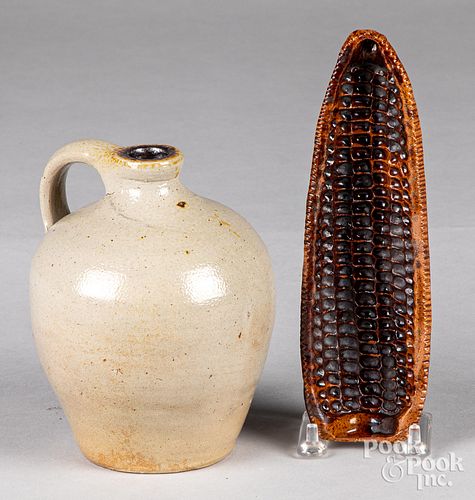 Redware corn mold and a stoneware jug