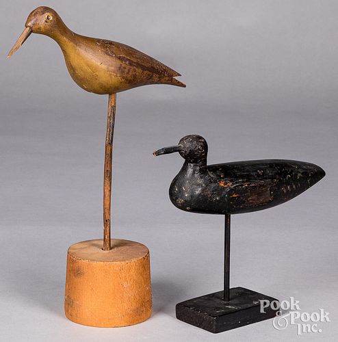 Two carved and painted shorebird decoys
