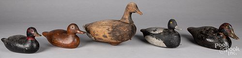 Five carved and painted duck decoys, 20th c.