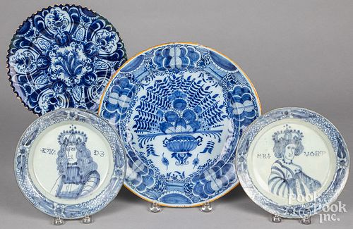 Four Delft plates/chargers, 18th c.