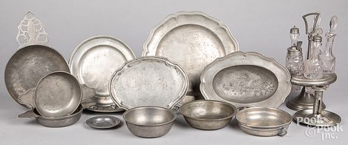 Continental pewter dishes and a cruet set