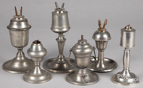 Six American pewter oil lamps, 19th c.