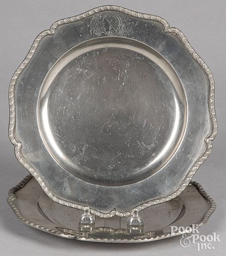 Pair of English pewter armorial plates, 18th c.