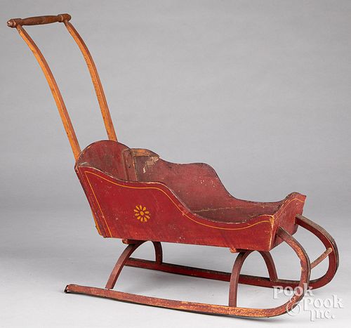 Child's painted pine doll push sled, 19th c.